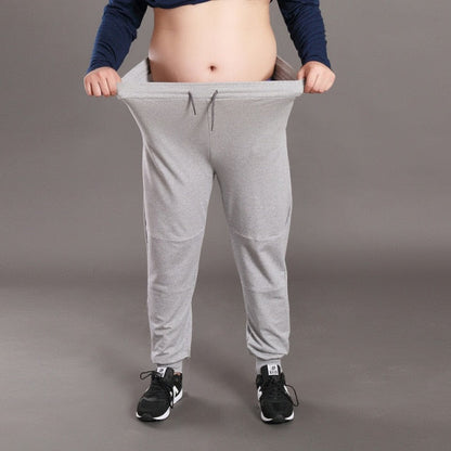 Men Big Size Solid Sweatpants Spring Elastic Narrow Feet Stretch Pants Loose Plus Size Casual Cotton Jogger Trousers 5XL 6XL 7XL